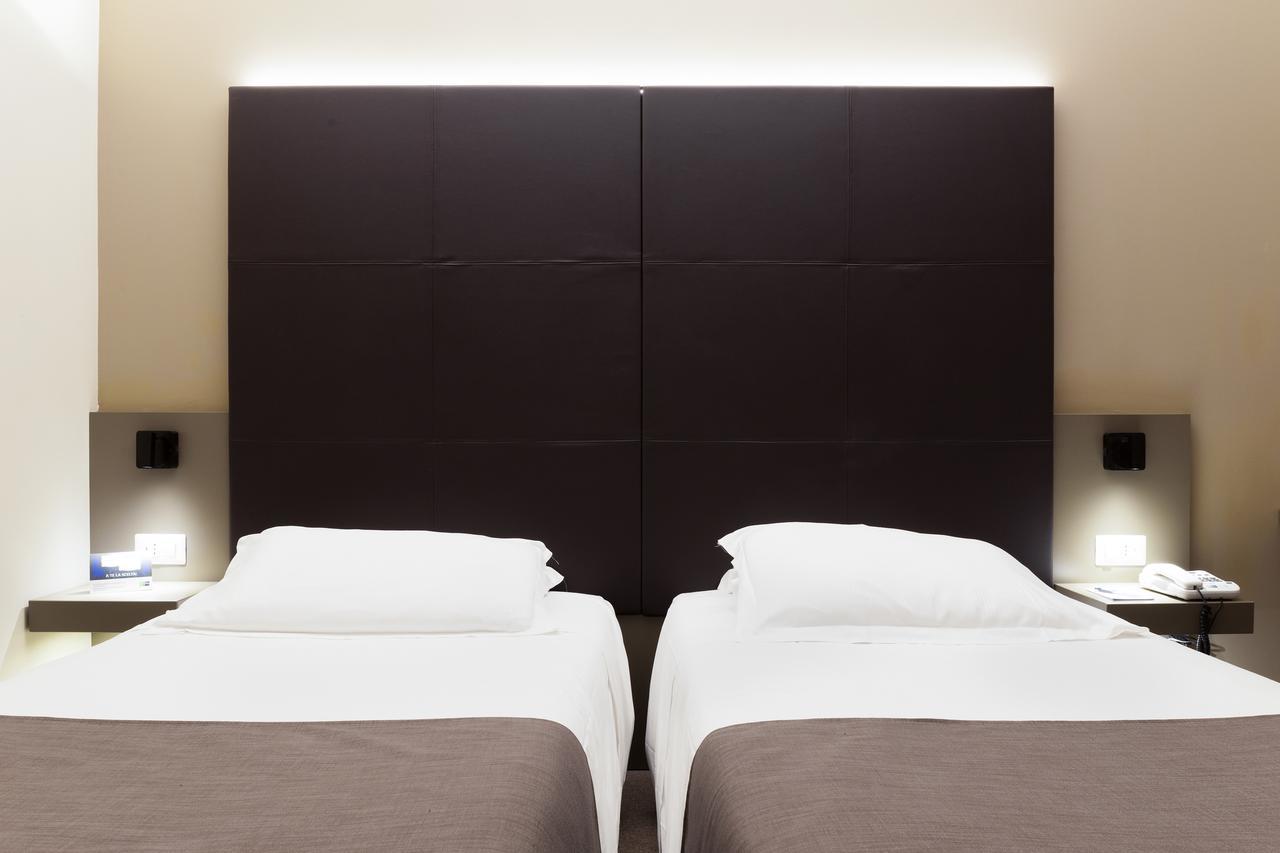 City Hotel & Suites Фоліньо Екстер'єр фото
